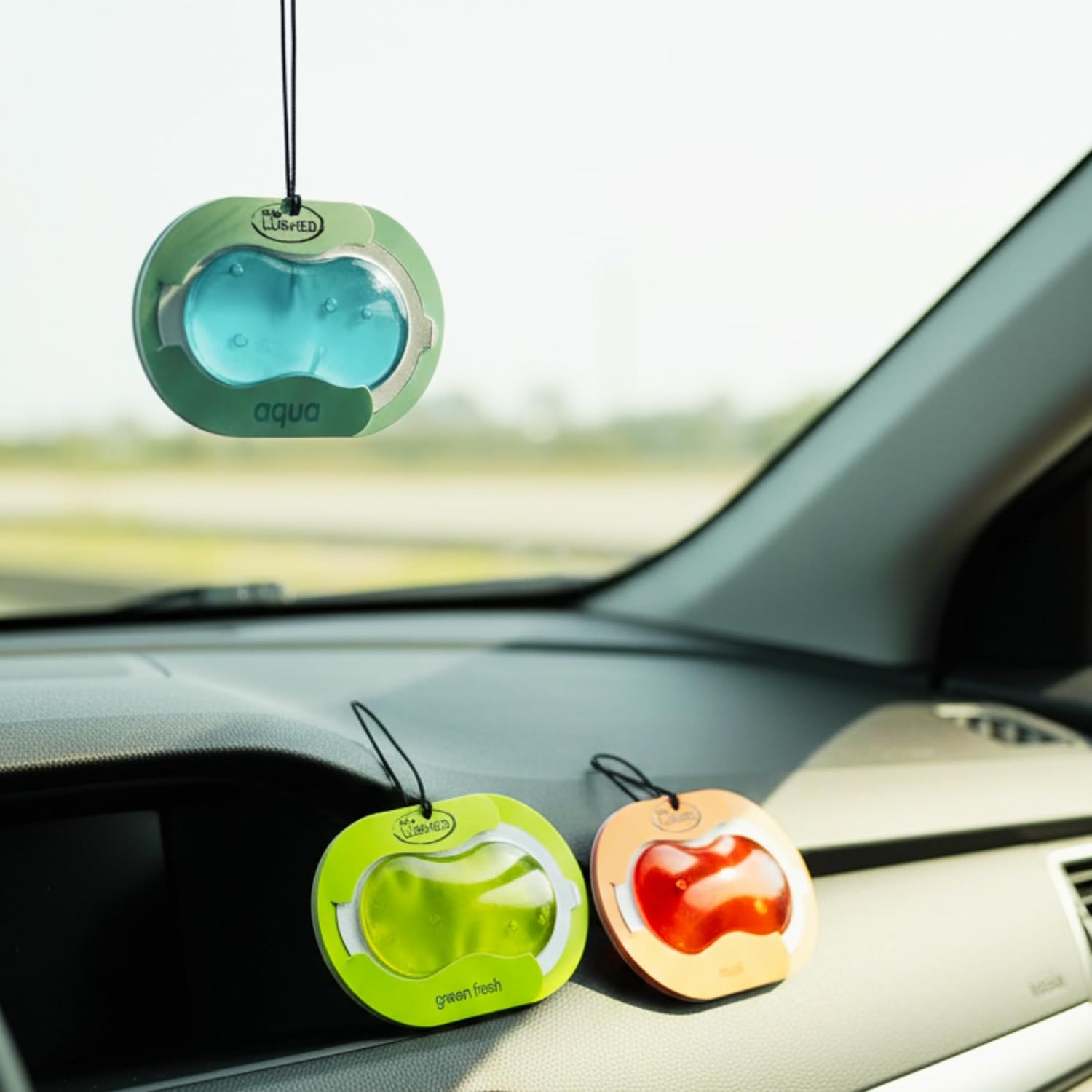 Non-spill car perfume gel pouch hanging freshener close-up view