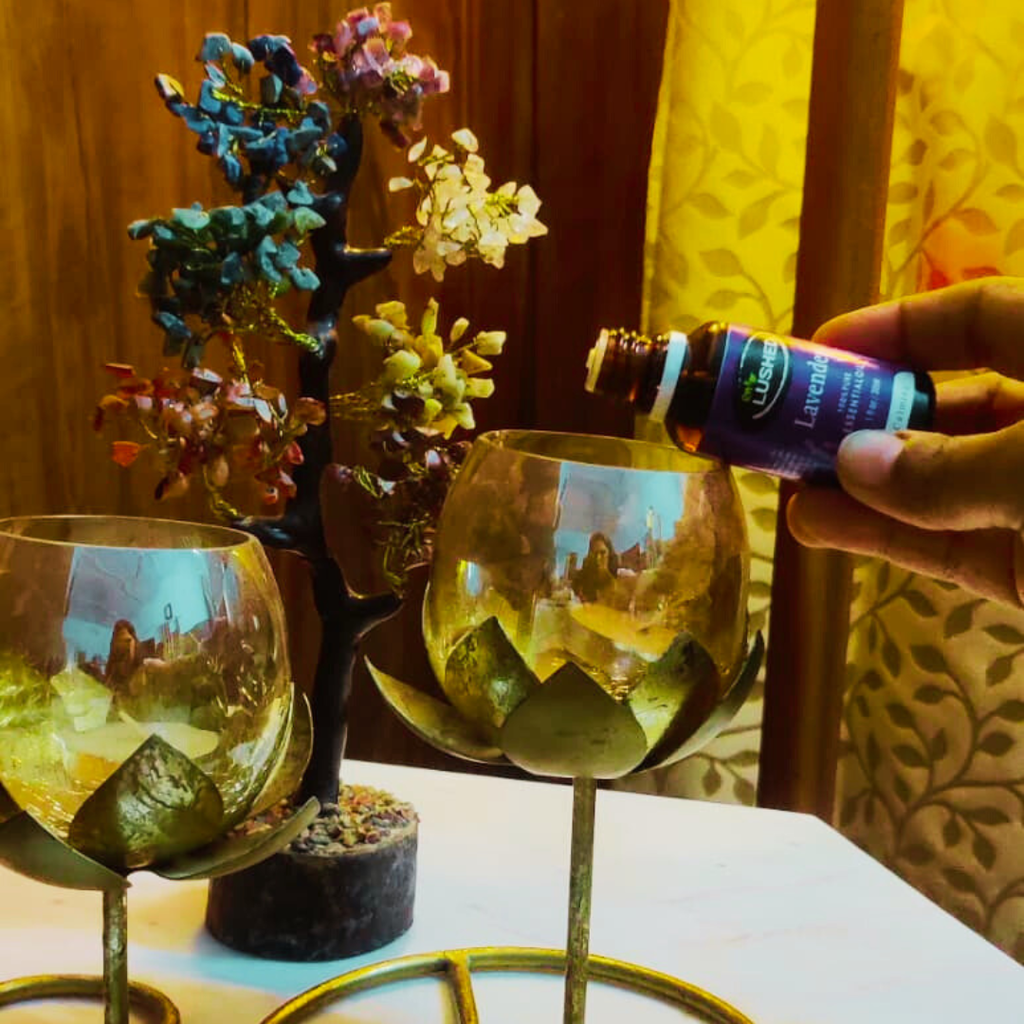 Herbal Home Fragrance oil bottle on decorative table with glasses