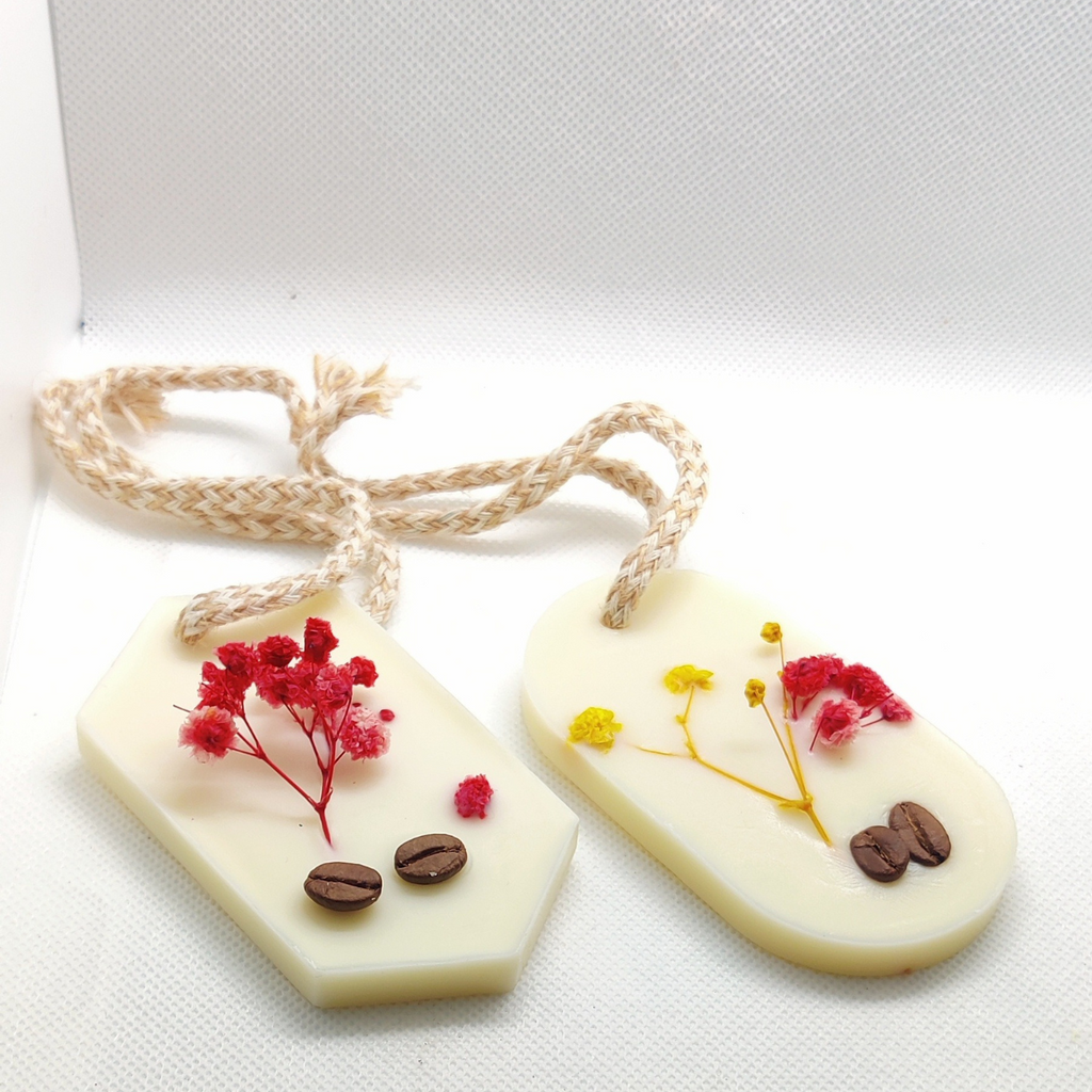 Pair of hexagon wax air fresheners tied with jute string